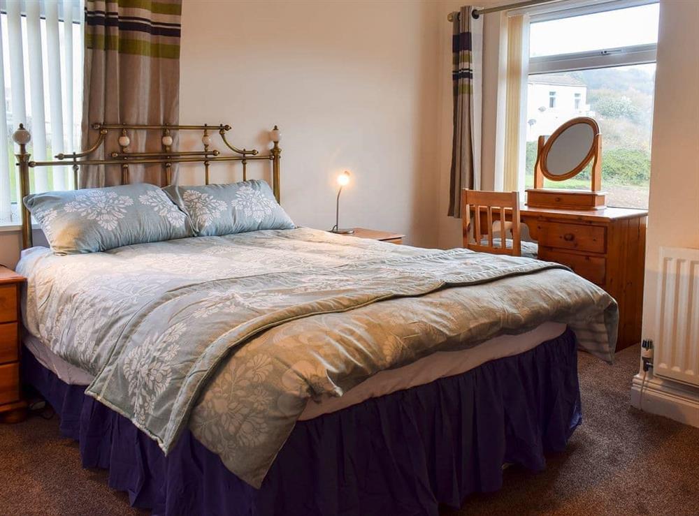 Spacious bedroom with kingsize bed at The Lobster Pot in Skinningrove, near Saltburn-by-the-Sea, Cleveland