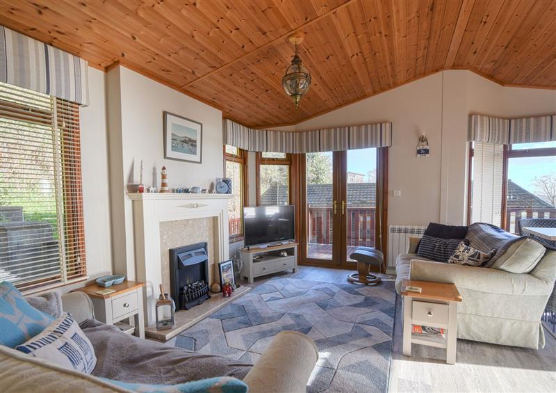 The living room at The Lodge @ Clifftop Park, Charmouth