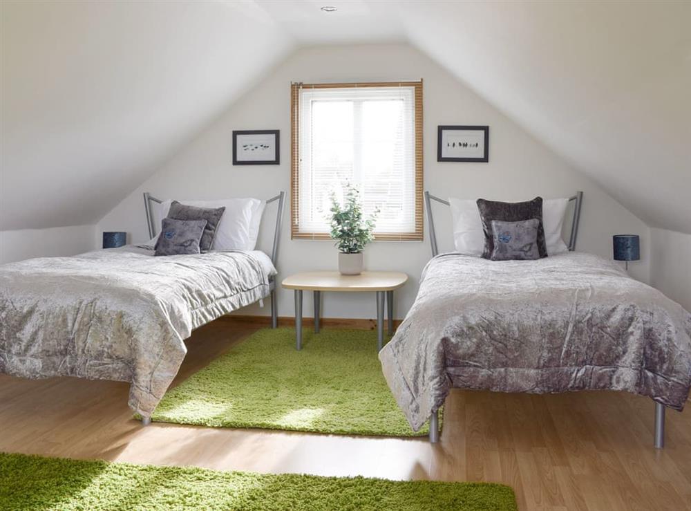 Comfortable twin bedroom at The Lodge at Lochnagar in Peat Inn, near St Andrews, Fife