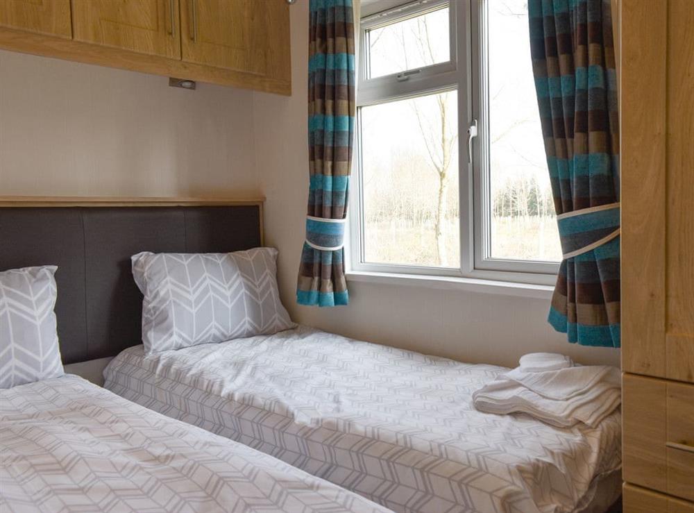Twin bedroom at The Lodge at Newmeads Farm in Wick, Glastonbury, Somerset