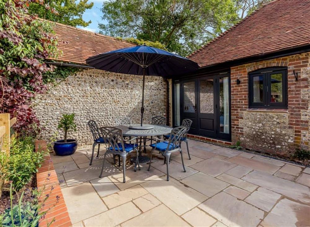 Charming patio at The Lodge at Oldbury Barns in Chichester, England