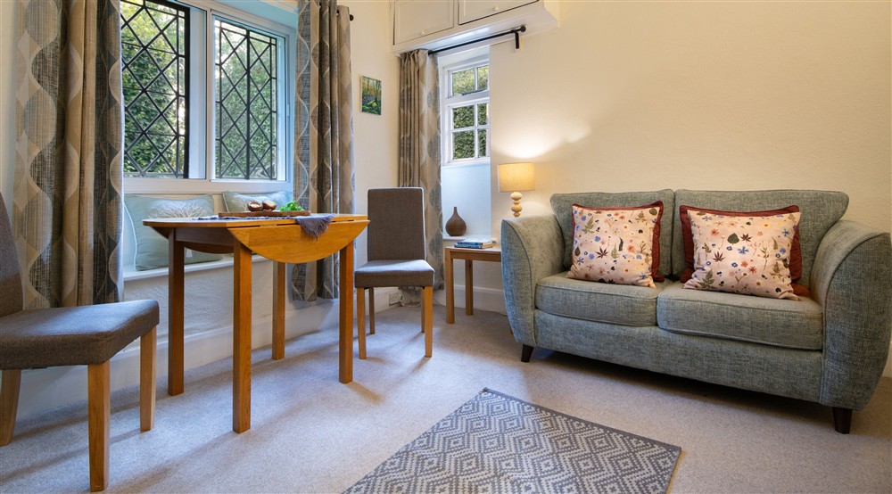 The dining area in the sitting room at The Lodge At Parke in Newton Abbot, Devon