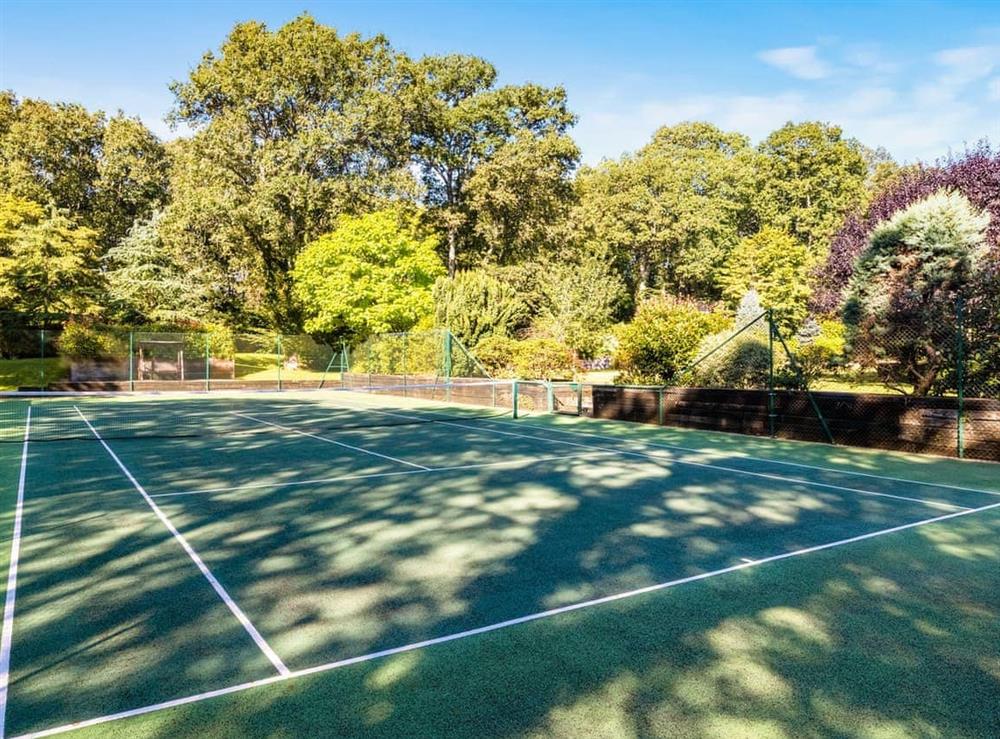 Tennis court at The Lodge at The Lake House in Plaistow, near Surrey, West Sussex