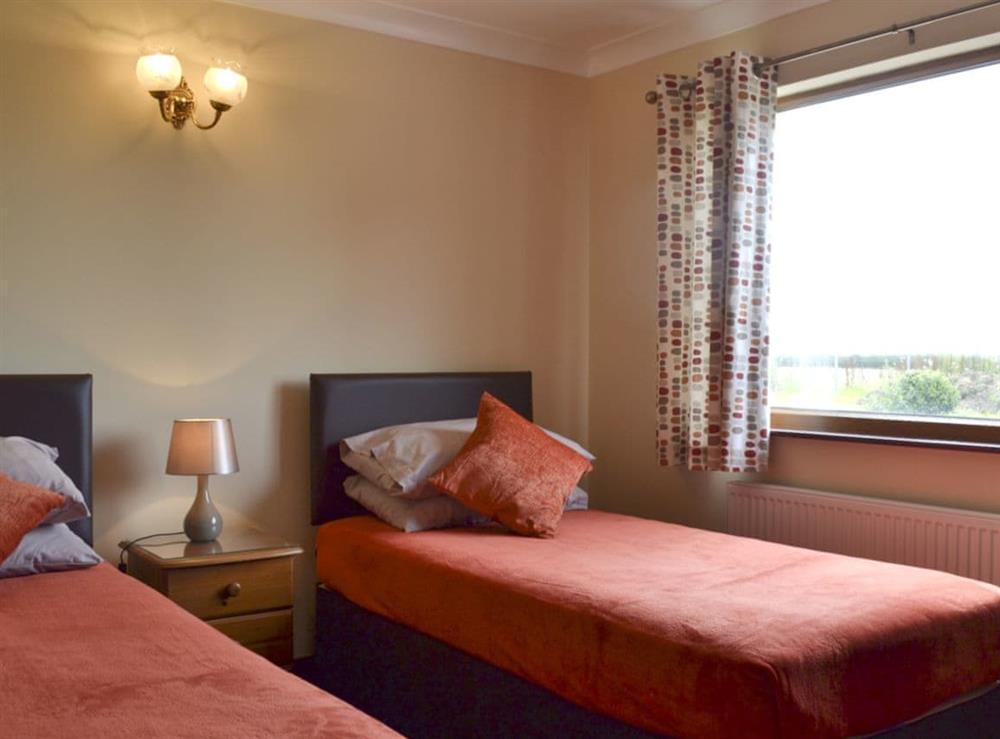 Delightful bedroom with twin beds at The Lodge in Brandesburton, near Driffield, North Humberside