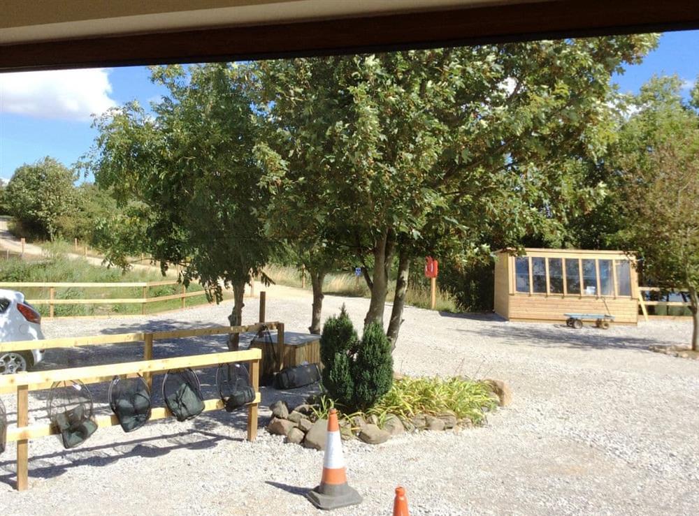 View over the parking areas from the sunroom at The Lodge in Brandesburton, near Driffield, North Humberside