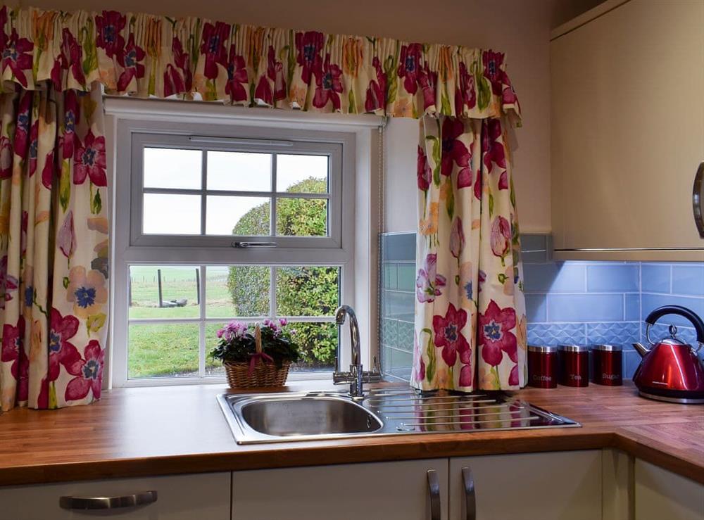 Kitchen with breakfast area (photo 2) at The Lodge Cottage in Methven, near Perth, Perthshire