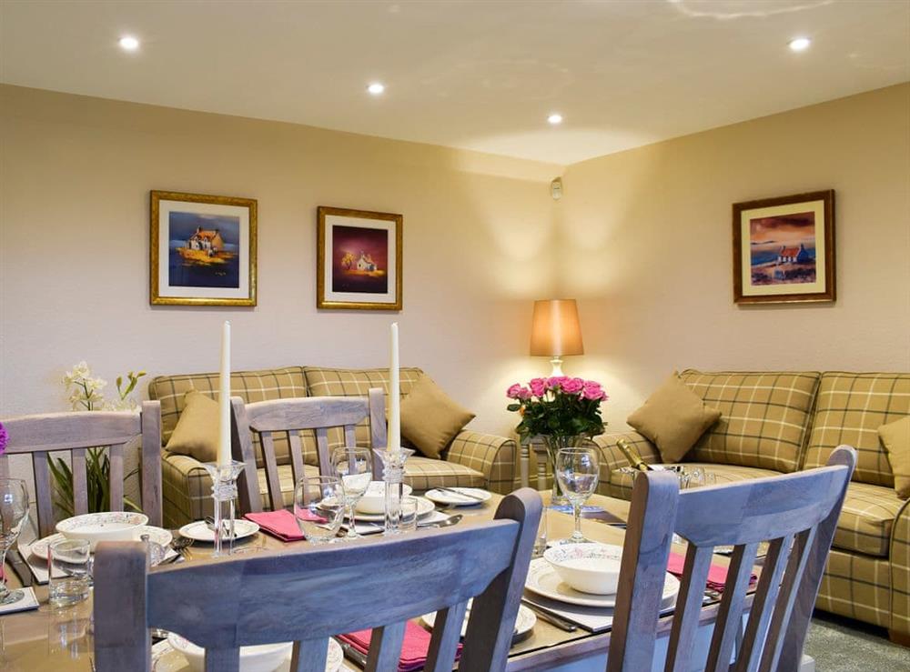 Relaxing living and dining room at The Lodge Cottage in Methven, near Perth, Perthshire