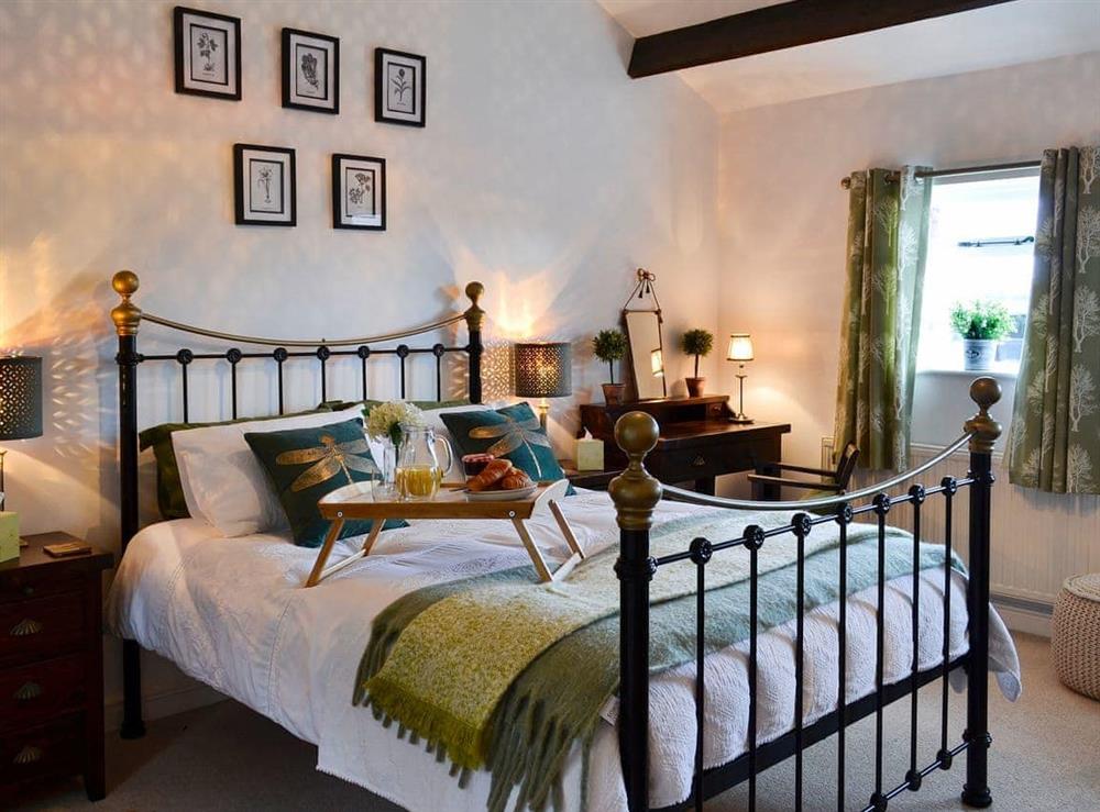 Tranquil bedroom with kingsize bed at The Lodge in Dyserth, near Prestatyn, Denbighshire