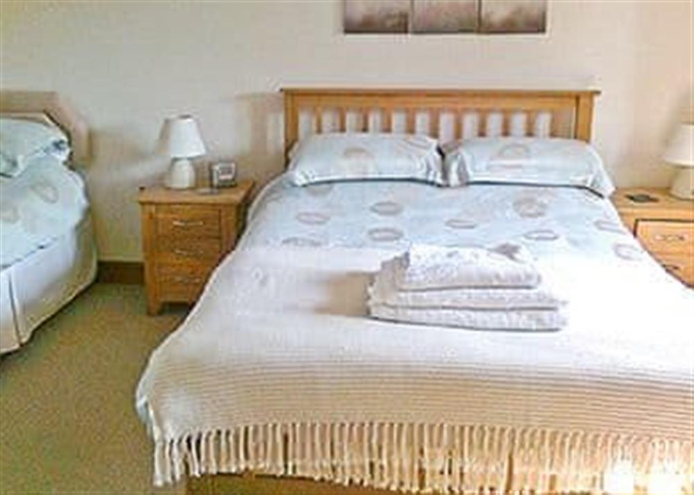 Twin bedroom at The Lodge in Lydney, Gloucestershire