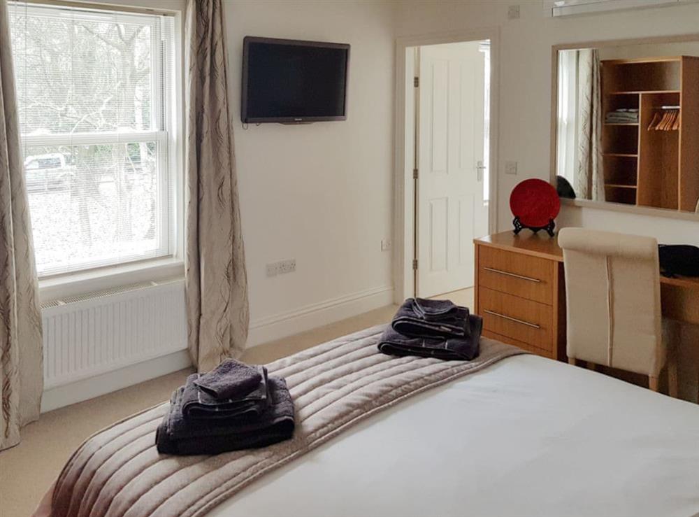 Comfortable double bedroom with en-suite on the first floor at The Lodge in North Duffield, near York, North Yorkshire