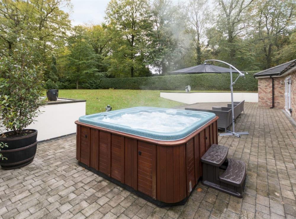 Relaxing hot tub on the terrace at The Lodge in North Duffield, near York, North Yorkshire