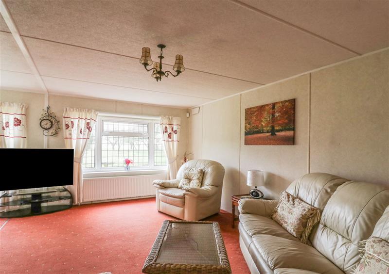 Relax in the living area at The Lodge, Attleborough