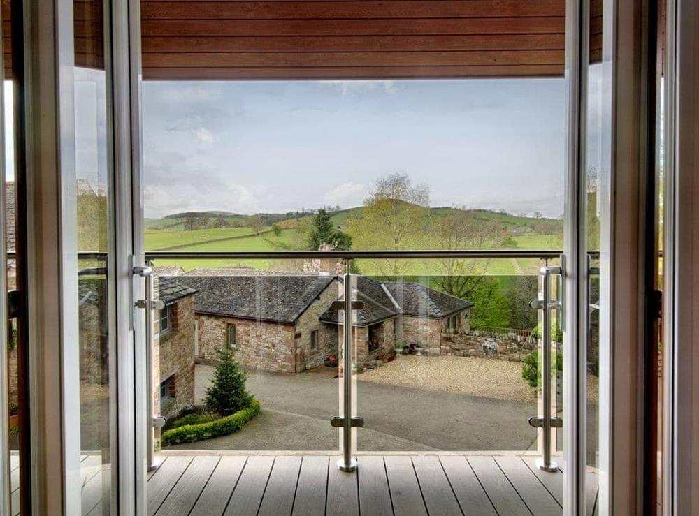 Access from living area to terrace at The Lodge in Pooley Bridge, Ullswater, Cumbria
