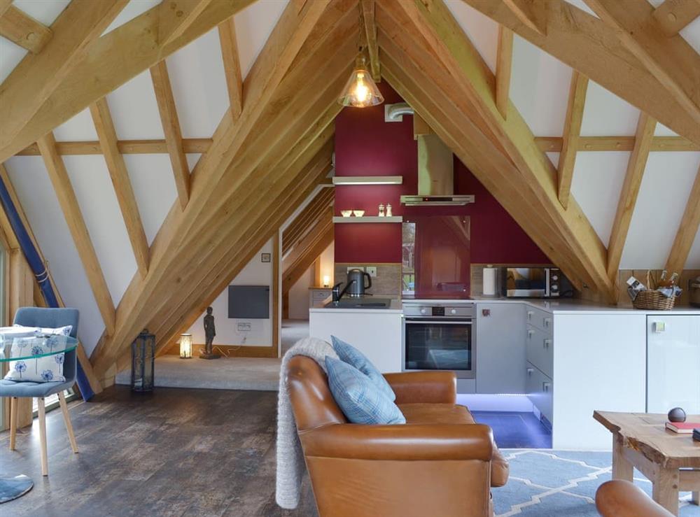 Characterful living areas with exposed beams throughout at The Lodge in Sandley, near Shaftesbury, Dorset