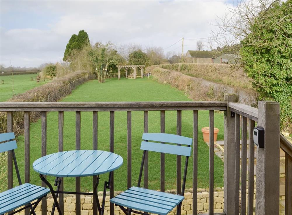 Lovely views over the lawned garden from the terrace at The Lodge in Sandley, near Shaftesbury, Dorset