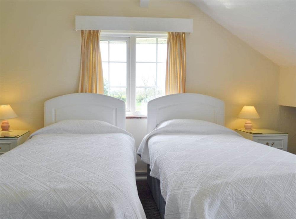 Comfortable twin bedroom at The Lodge in Scarning, near Dereham, Norfolk