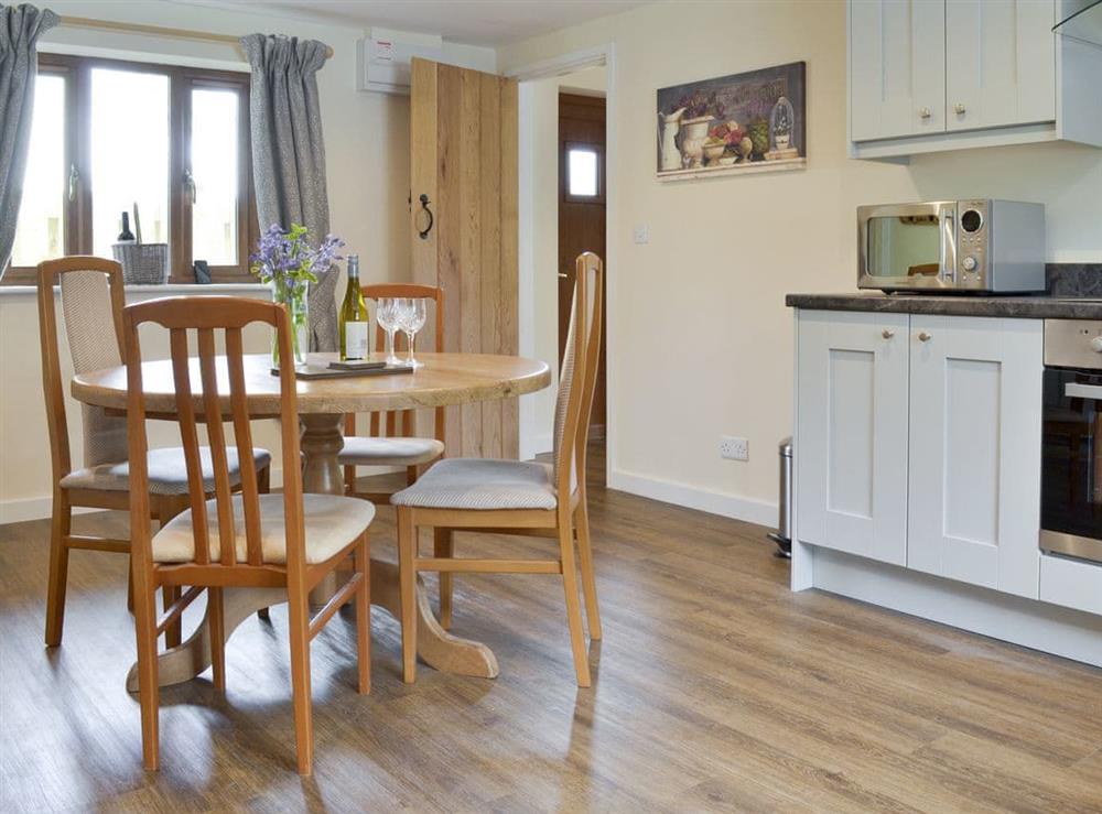 Convenient dining area within kitchen at The Lodge in Wedmore, near Cheddar, Somerset
