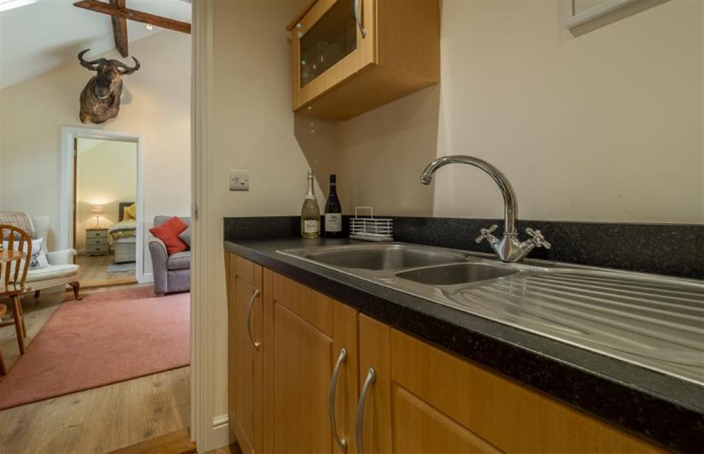 Kitchen leading to the open-plan living space at The Lodge, Wherstead, Wherstead