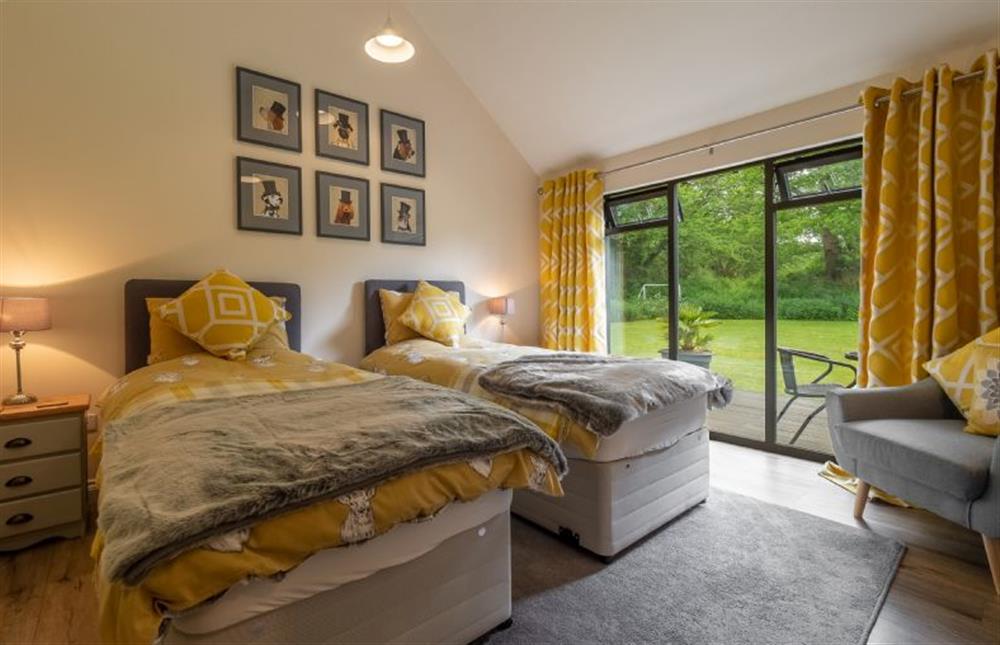 Master bedroom with 3’ single beds which can be made up as a 6’ super-king size bed on request