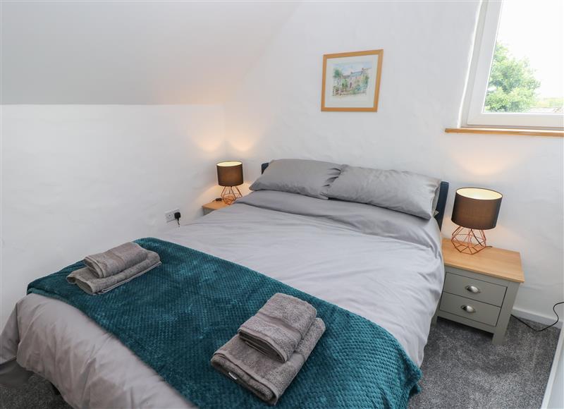 A bedroom in The Loft @ Wisteria Cottage at The Loft @ Wisteria Cottage, Saundersfoot