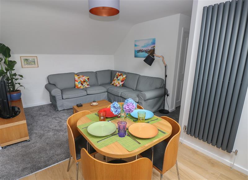Relax in the living area at The Loft @ Wisteria Cottage, Saundersfoot
