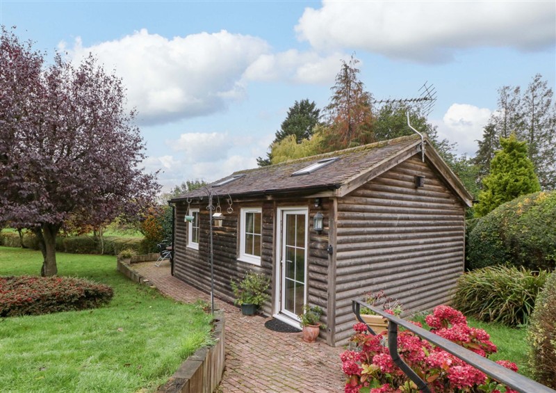 This is the setting of The Log Cabin at The Log Cabin, Corse near Gloucester