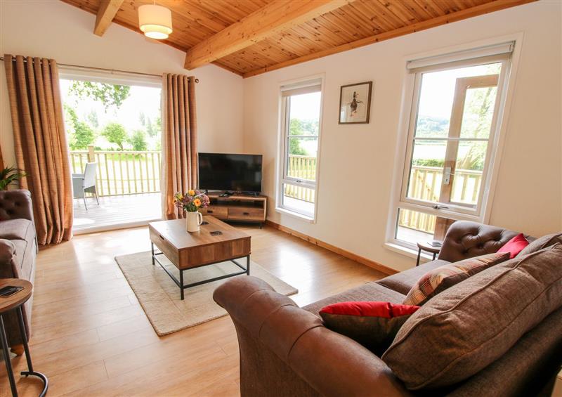 Enjoy the living room at The Log Cabin, Newnham Bridge near Tenbury Wells
