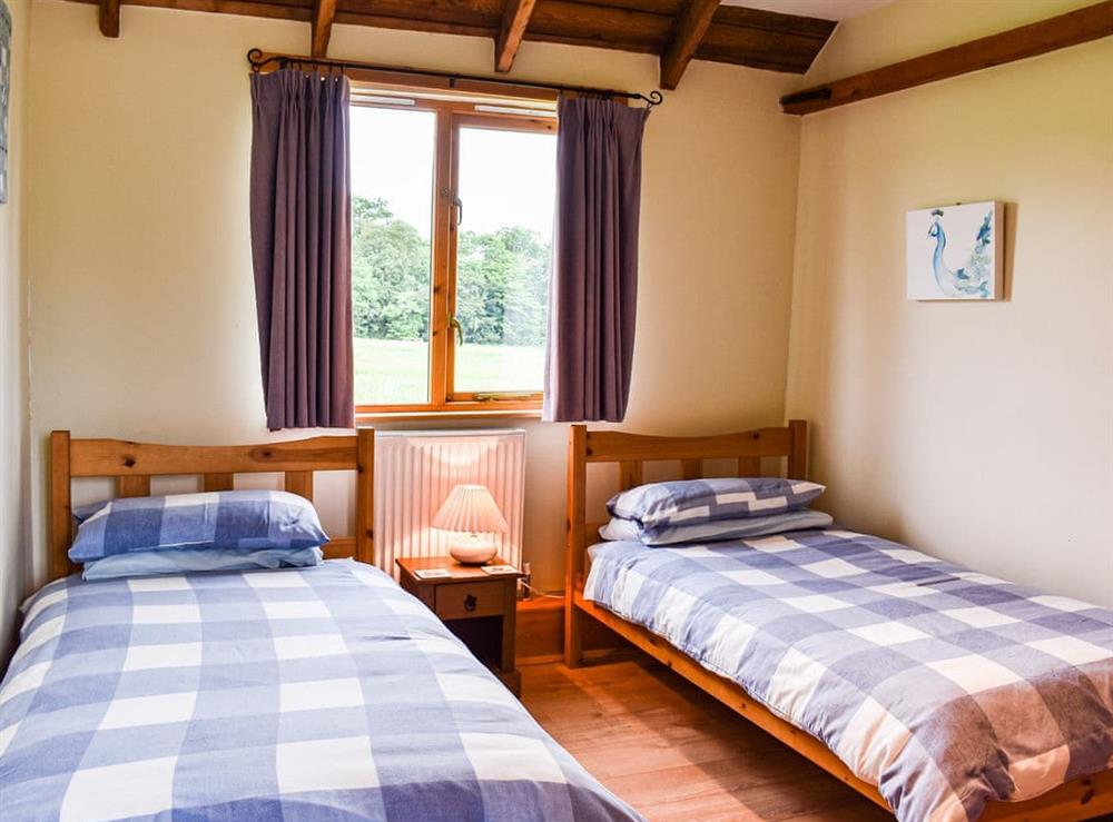 Twin bedroom at The Long Barn in Chelmsford, Essex
