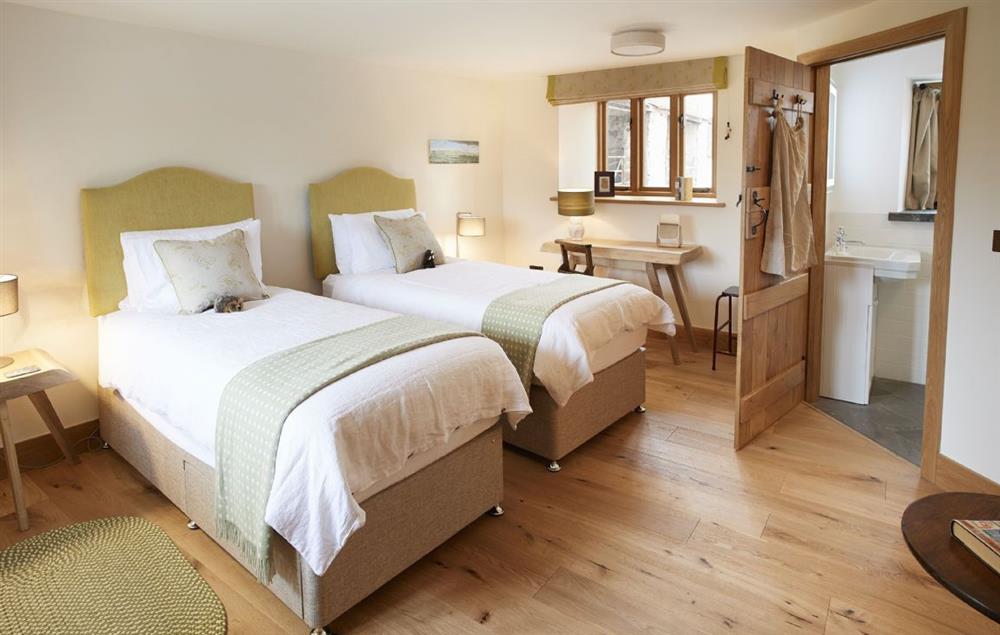 The Garden bedroom with zip and link bed that can be configured as a super king or two single beds at The Longbarn at Caerfallen, Ruthin
