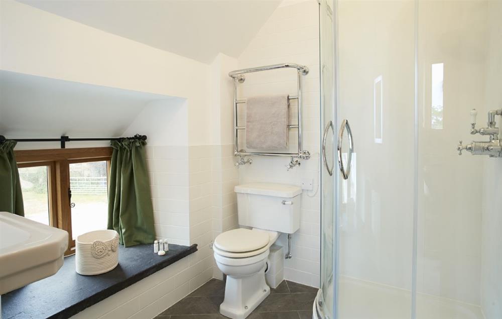 The Tudor bedroom en-suite shower room at The Longbarn at Caerfallen, Ruthin
