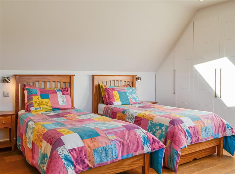 Twin bedroom at The Longhouse at Threave in Castle Douglas, Kirkcudbrightshire