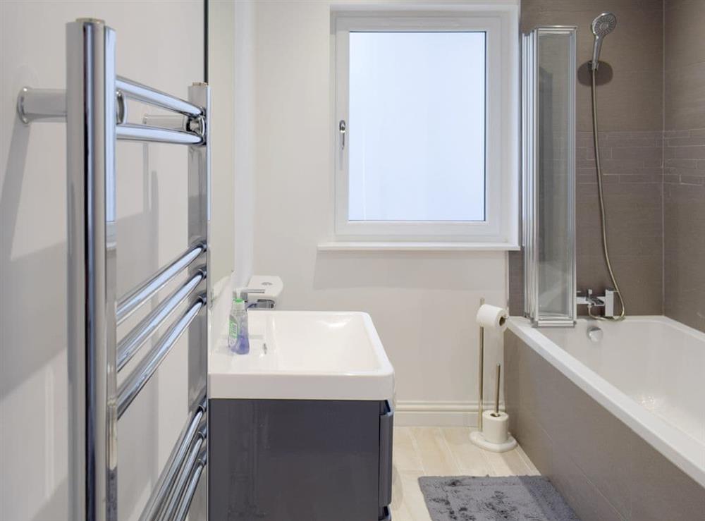 Family bathroom with shower over bath at The Lookout in Portpatrick, Wigtownshire