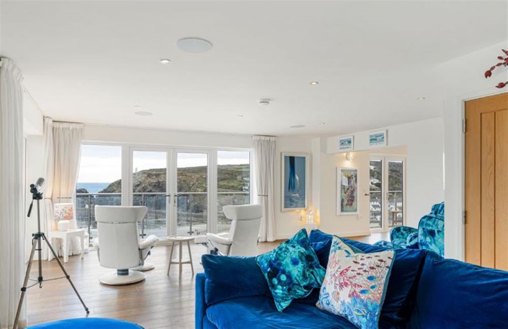 Open-plan spacious room with comfy sofas, television, stereo, telescope and doors to wrap around decking (photo 5)