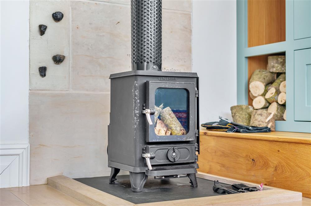 The wood burning stove adds a cosy touch to evenings spent star gazing from the second floor sitting room