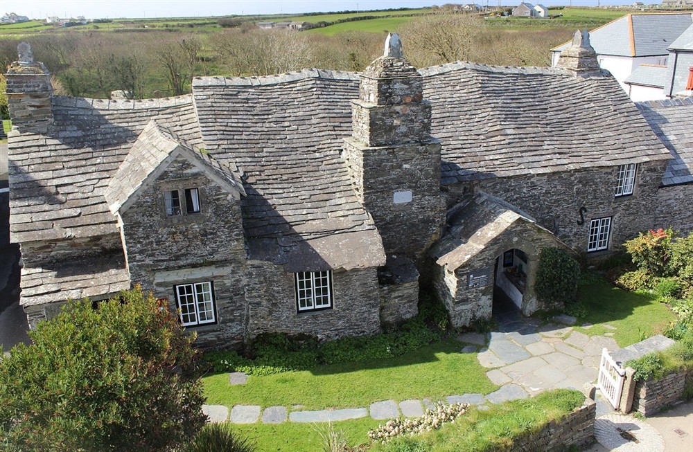 Tintagel Old Post Office viewed from above showing its wonky roof and position in the landscape. at The Lugger in Boscastle, Cornwall