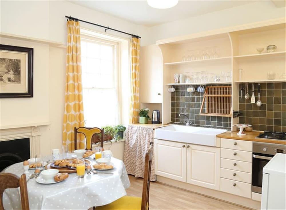 Kitchen with dining area at The Lymington Apartment in Lymington, New Forest