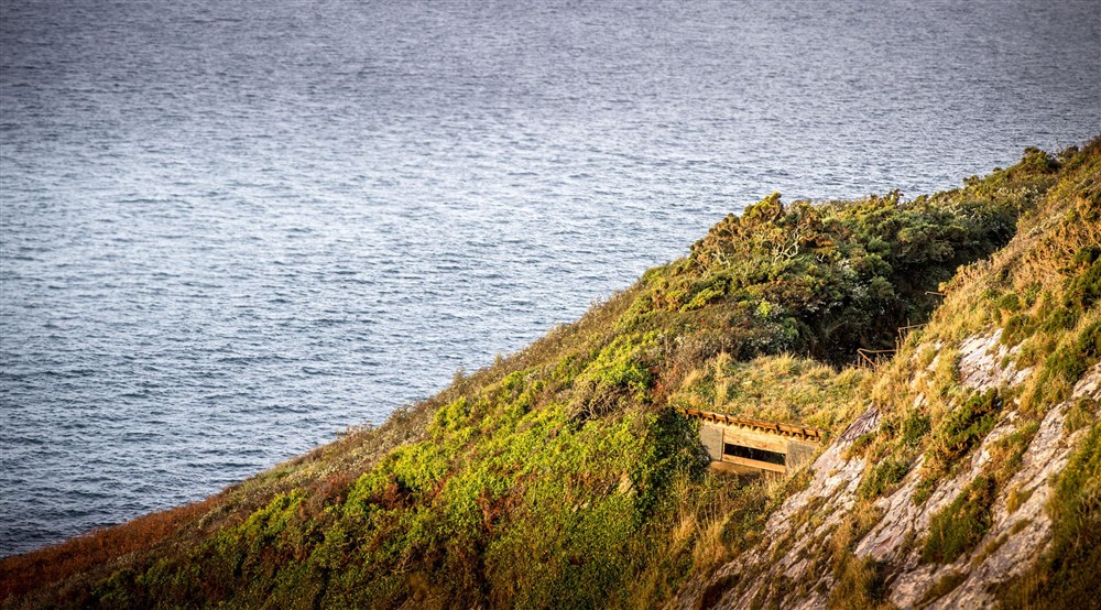 The bird hide near the holiday cottages on St Anthony Head, Cornwall at The Major's Quarter in Roseland, Cornwall