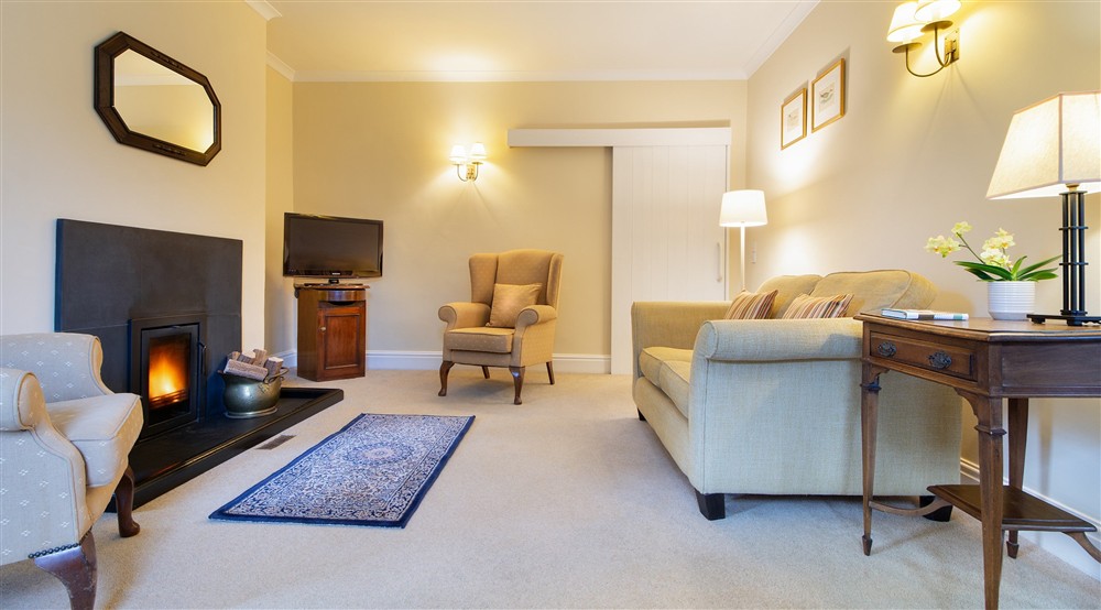 The open-plan sitting and dining room (photo 2) at The Major's Quarter in Roseland, Cornwall