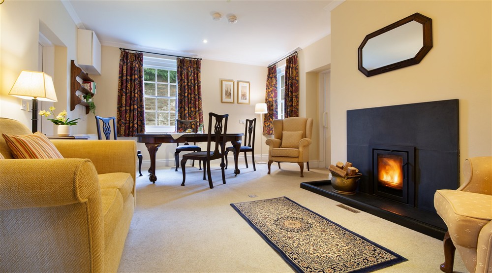 The open-plan sitting and dining room at The Major's Quarter in Roseland, Cornwall