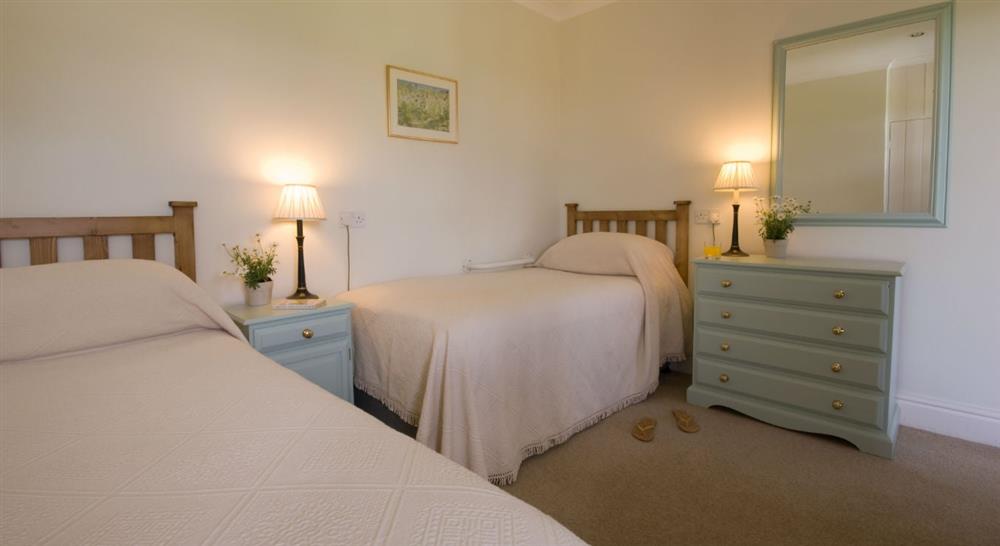 The twin bedroom at The Major's Quarter in Roseland, Cornwall