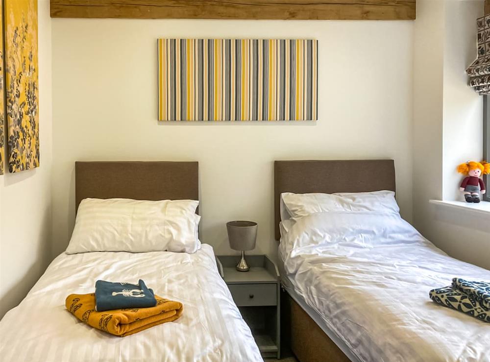 Twin bedroom at The Maltings in Kingscote, Gloucestershire