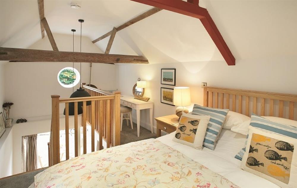 Mezzanine bedroom on upper level with king-size bed (photo 2) at The Maltings, Trunch