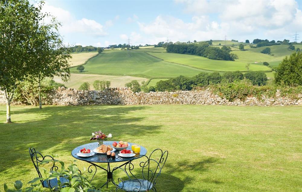 The terrace offers uninterrupted views down to the river and stretching several miles along and across the spectacular Yarty River valley with its pattern of small irregular fields and copses