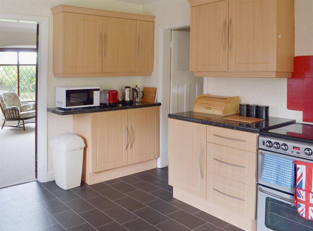 Roomy fitted kitchen with modern appliances at The Manor House in Churchtown, near Southport, Lancashire