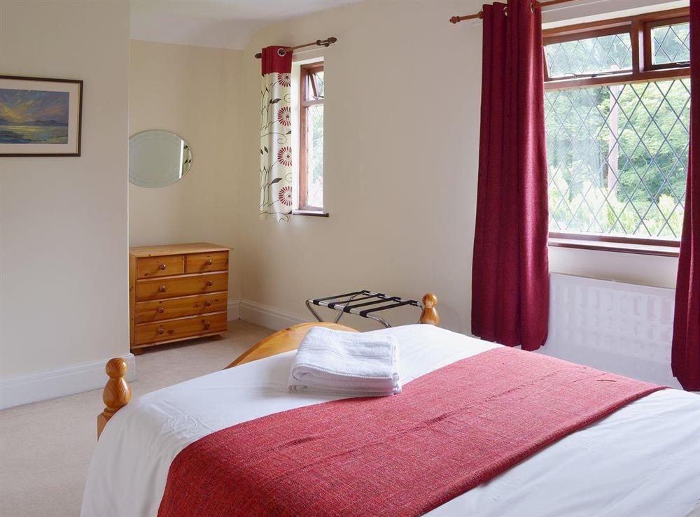 Spacious double bedroom with leaded windows at The Manor House in Churchtown, near Southport, Lancashire