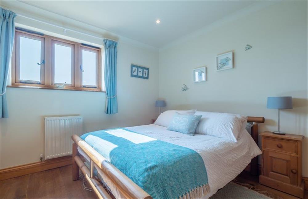 Bedroom two with double bed at The Meadows Dairy, Bawdsey