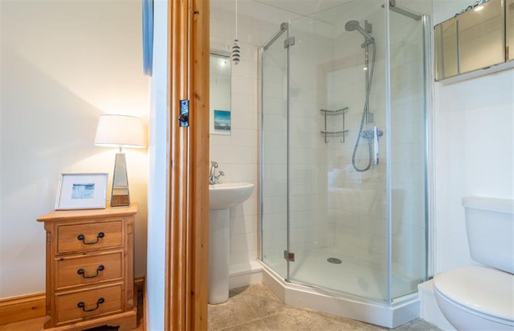 En-suite shower room with shower, wash basin and WC at The Meadows Dairy, Bawdsey