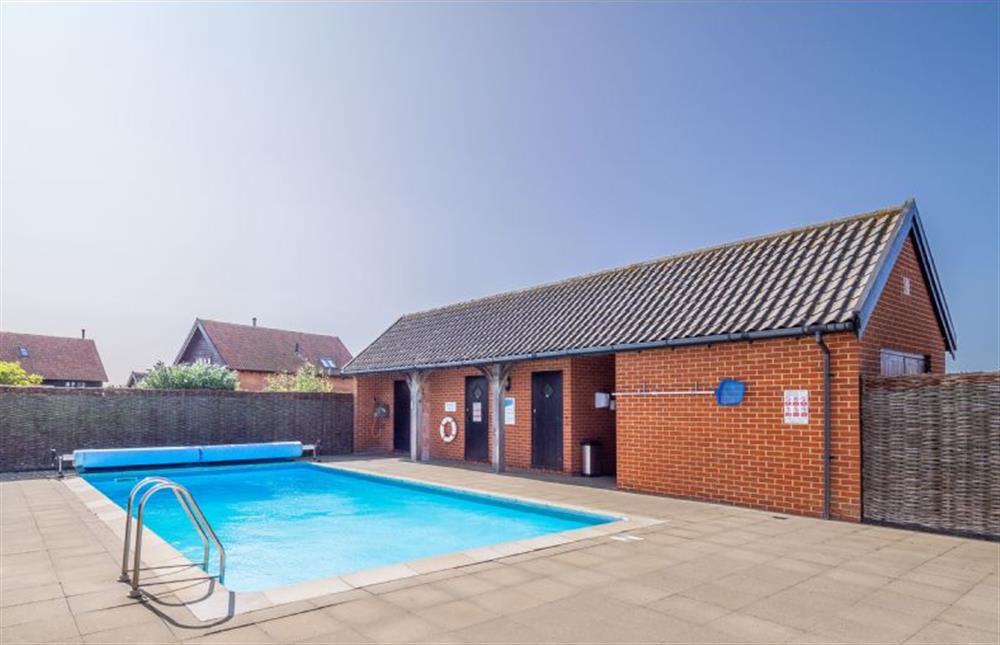 The shared swimming pool at The Manor Estate at The Meadows Dairy, Bawdsey