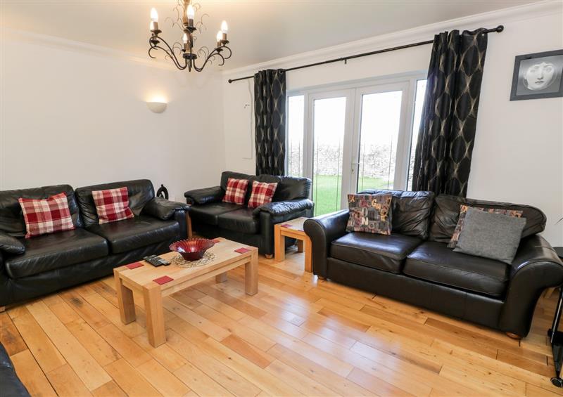 Relax in the living area at The Meadows, Pentraeth