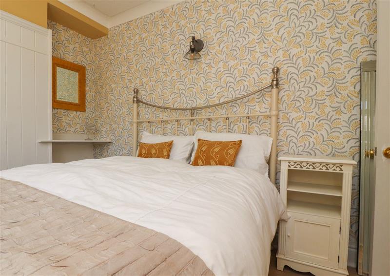 A bedroom in The Mews Cottage at The Mews Cottage, Lytham St. Annes